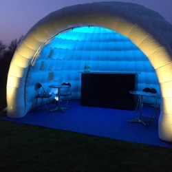 inflatable igloo lit with with blue light