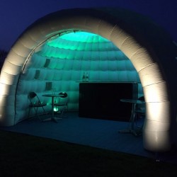 igloo bar lit up in green